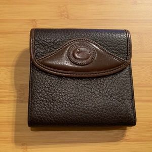 Retired Dooney & Bourke Bi-fold wallet.